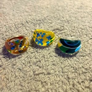Colorful rings, more likely to fit if you got small fingers,